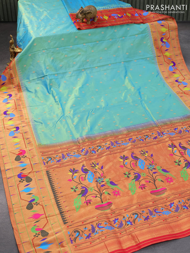 Pure paithani silk saree dual shade of teal blue and red with allover zari woven buttas and zari woven peacock design paithani border