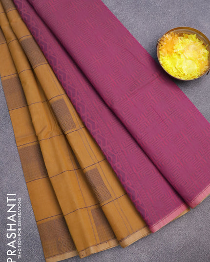 South kota saree dark mustard and pink with allover checked pattern & buttas in borderless style