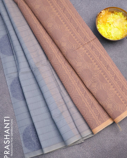 South kota saree grey and peach orange with allover thread weaves & buttas in borderless style