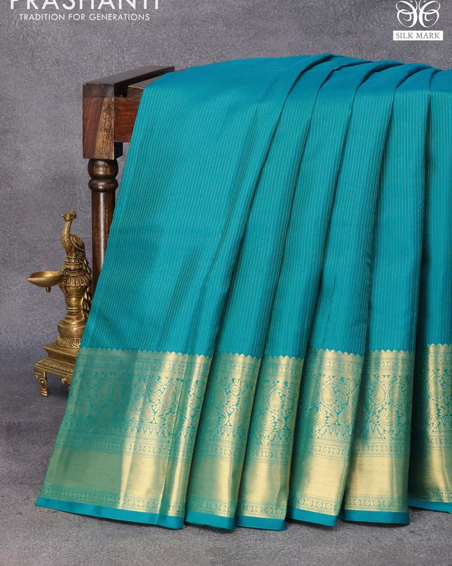 Pure kanjivaram silk saree teal blue and purple with allover zari weaves and long zari woven border & Allover wevaes