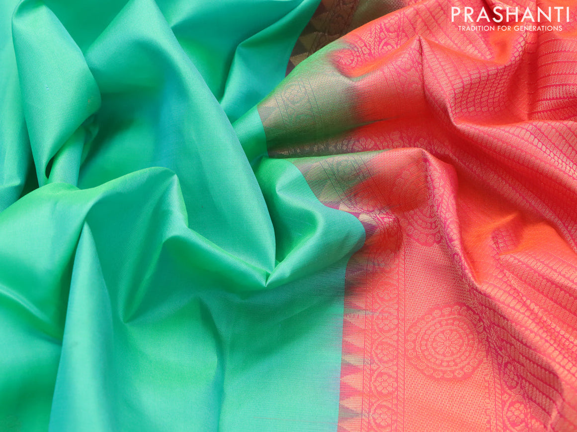 Pure kanjivaram silk saree dual shade of teal bluish green and orange with zari woven buttas and zari woven border & Butta style