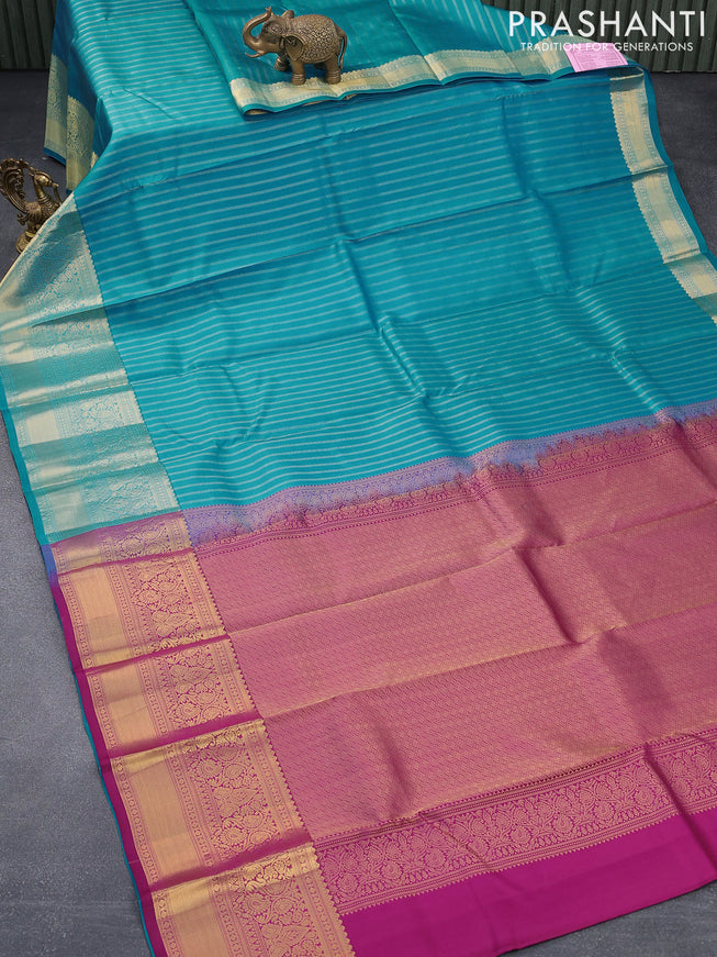 Pure kanjivaram silk saree blue and deep purple with allover zari weaves and zari woven border & Allover weaves
