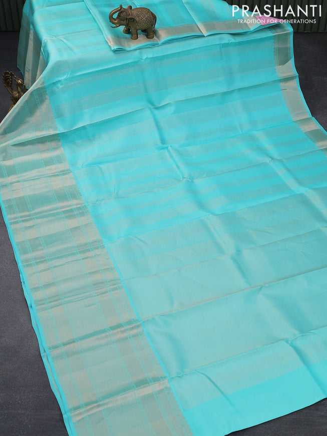 Pure kanjivaram silk saree light blue with allover silver zari weaves and long silver zari woven border & Allover weaves