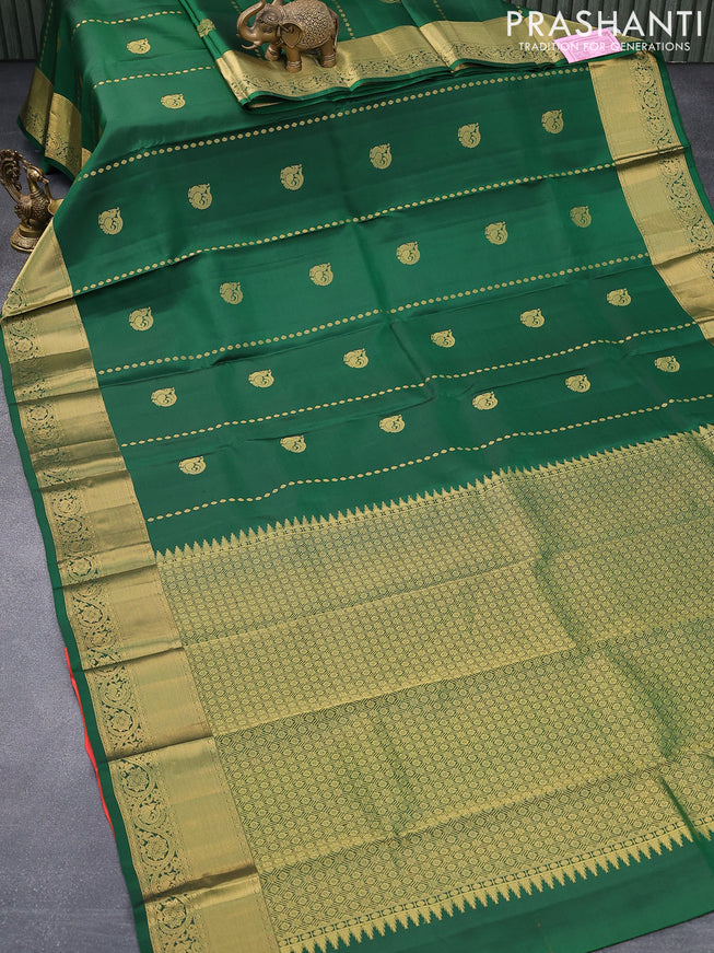 Pure kanjivaram silk saree green and dual shade of pinkish orange with annam zari woven buttas and zari woven border & Butta style