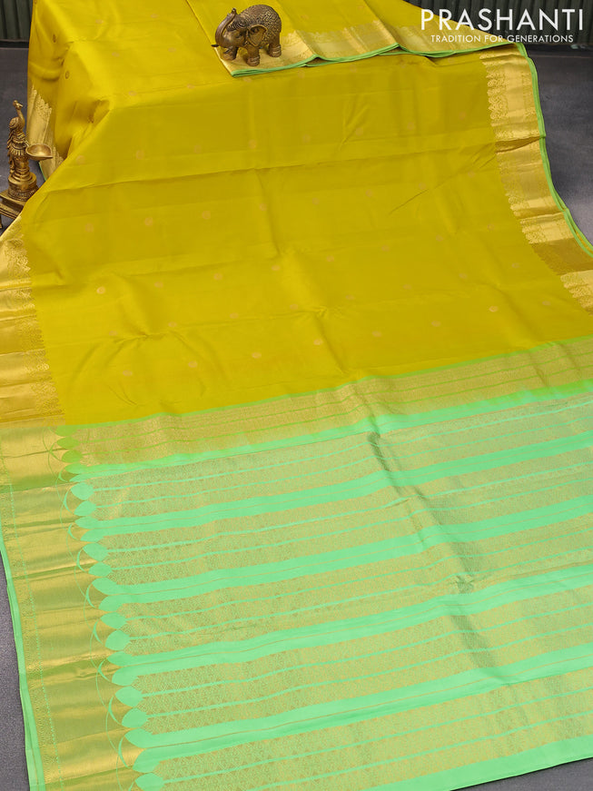 Pure kanjivaram silk saree lime yellow and pista green with zari woven buttas and zari woven border & Butta style