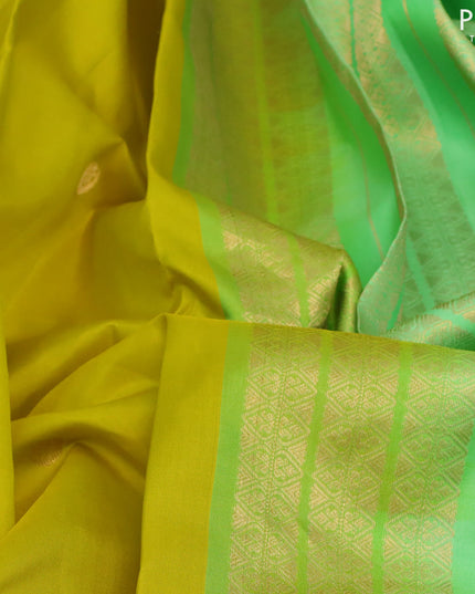 Pure kanjivaram silk saree lime yellow and pista green with zari woven buttas and zari woven border & Butta style