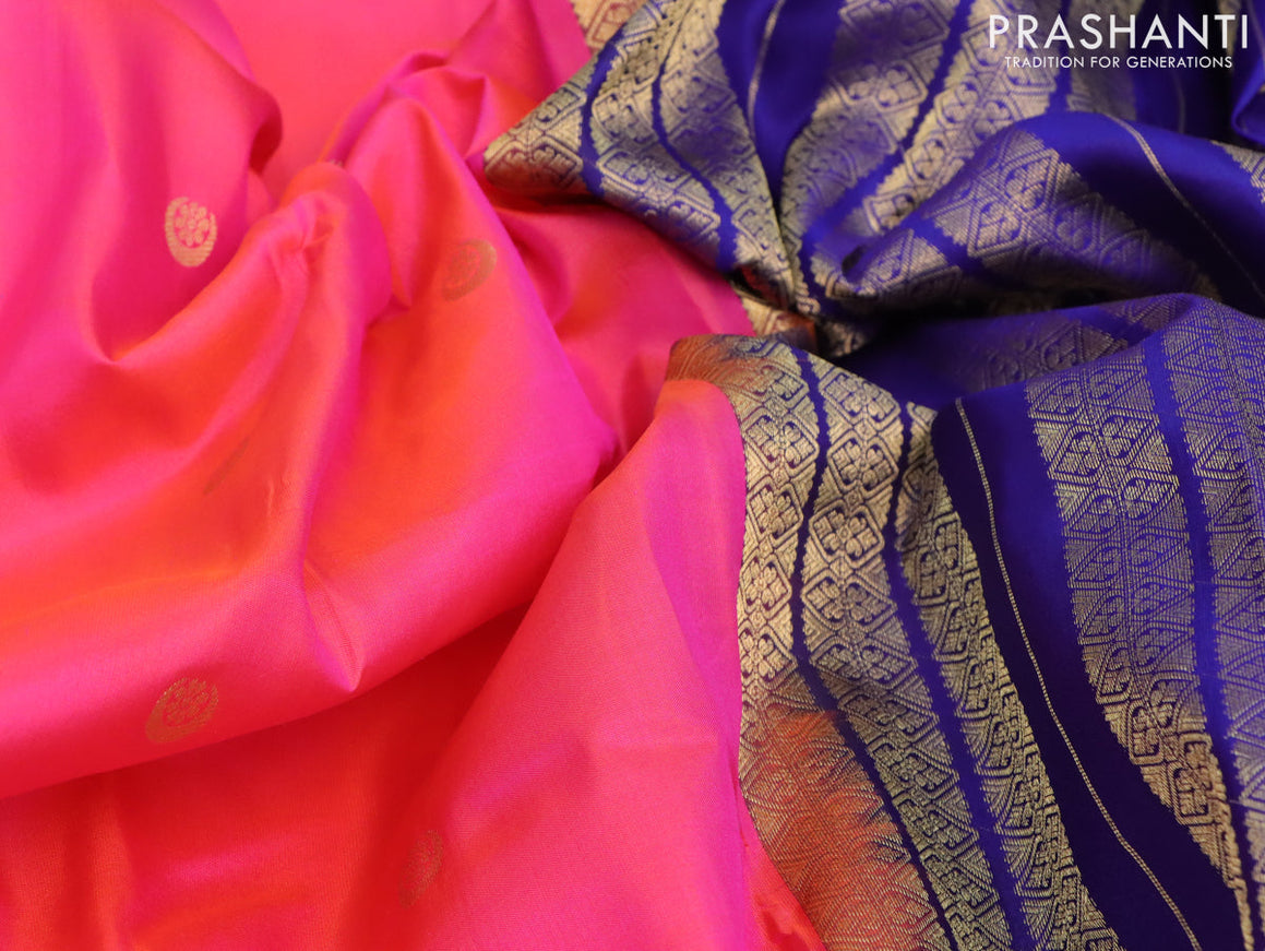 Pure kanjivaram silk saree dual shade of pinkish orange and blue with zari woven buttas and zari woven border & Butta style