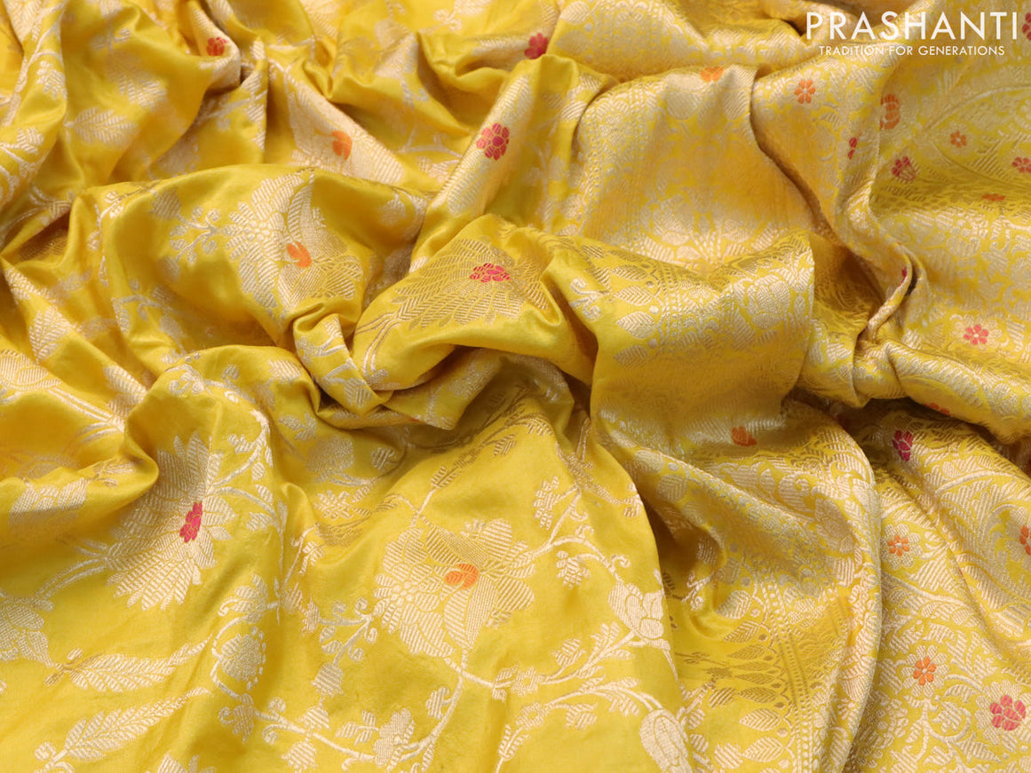 Banarasi uppada silk saree yellow with allover zari woven brocade weaves and rich floral zari woven border