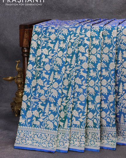 Banarasi uppada silk saree dual shade of bluish green with allover zari woven brocade weaves and zari woven border