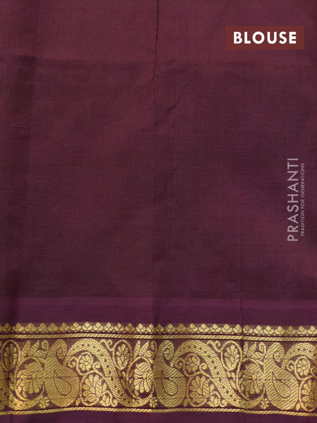 Silk cotton saree mustard yellow and brown with allover floral prints and zari woven border