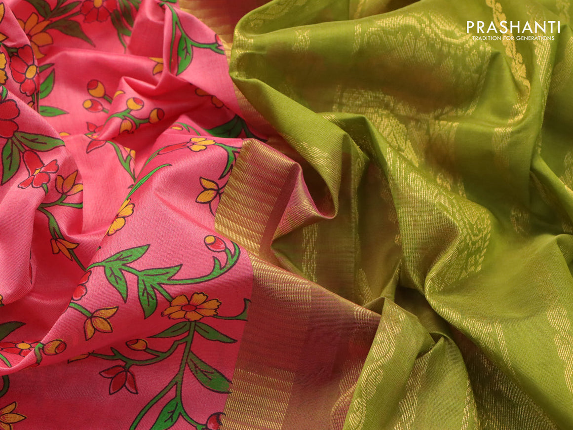 Silk cotton saree pink and mehendi green with allover floral prints and zari woven border
