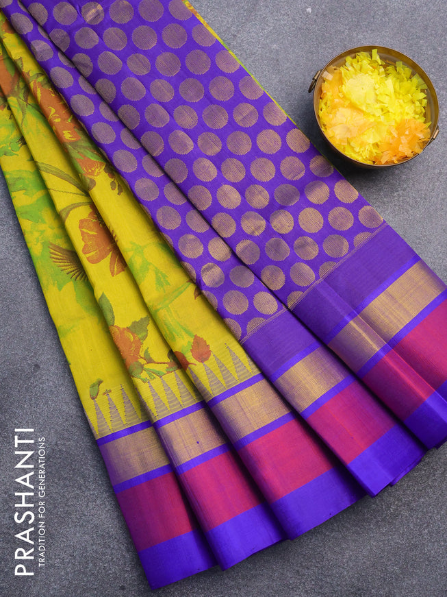 Silk cotton saree yellow and blue with floral prints and temple design zari woven border