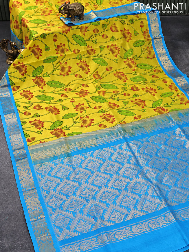 Silk cotton saree yellow and cs blue with allover pichwai prints and floral zari woven border