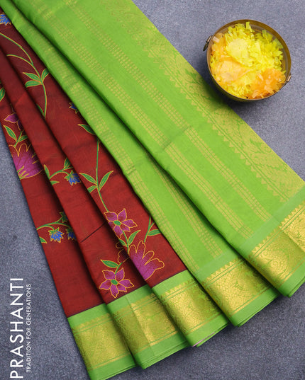 Silk cotton saree maroon and light green with allover floral prints and zari woven border