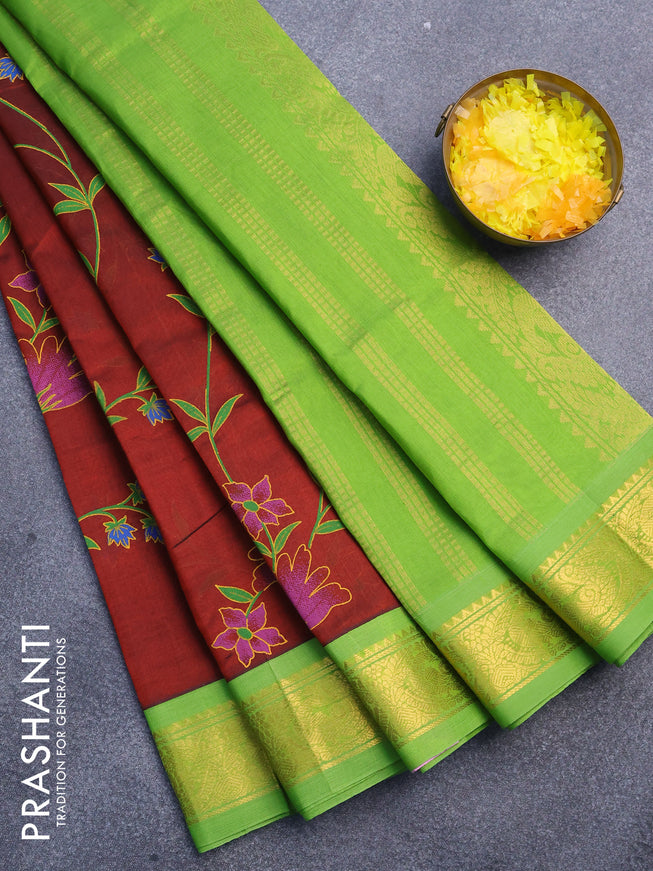 Silk cotton saree maroon and light green with allover floral prints and zari woven border