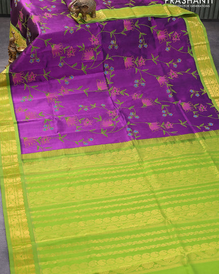Silk cotton saree purple and light green with allover floral prints and paisley zari woven border
