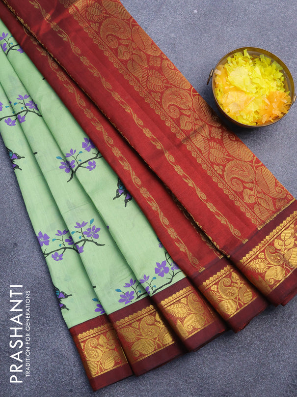 Silk cotton saree pista green and maroon with allover floral prints and zari woven border