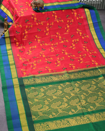 Silk cotton saree red and green with allover prints and temple design zari woven simple border