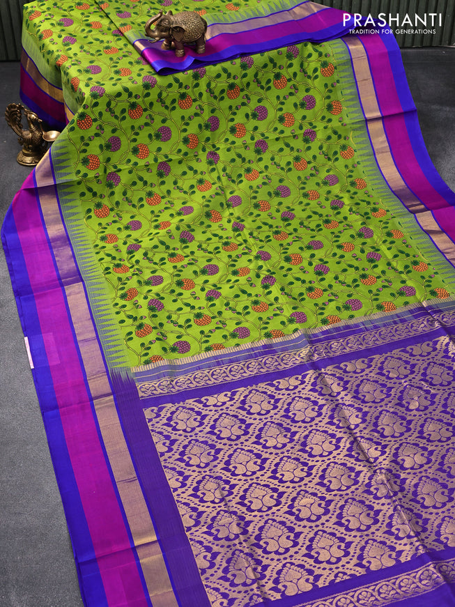 Silk cotton saree light green and blue with allover prints and temple design zari woven simple border