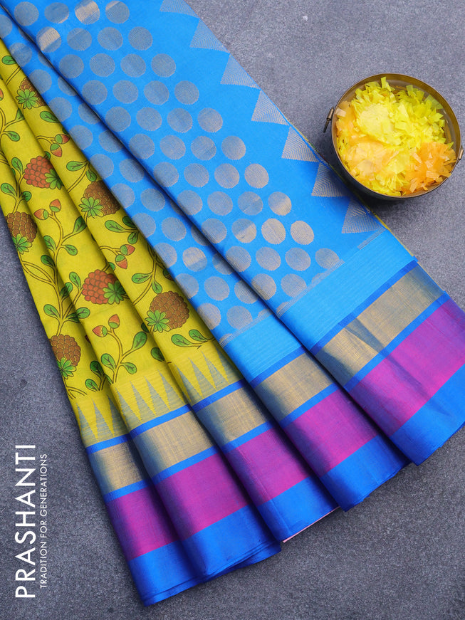 Silk cotton saree yellow and cs blue with allover prints and temple design zari woven border