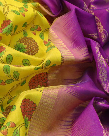 Silk cotton saree yellow and purple with allover prints and rettapet zari woven border