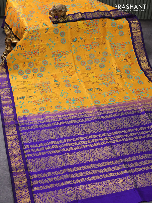 Silk cotton saree mustard yellow and blue with allover prints and zari woven border
