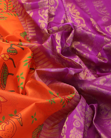 Silk cotton saree orange and purple with allover prints and zari woven border