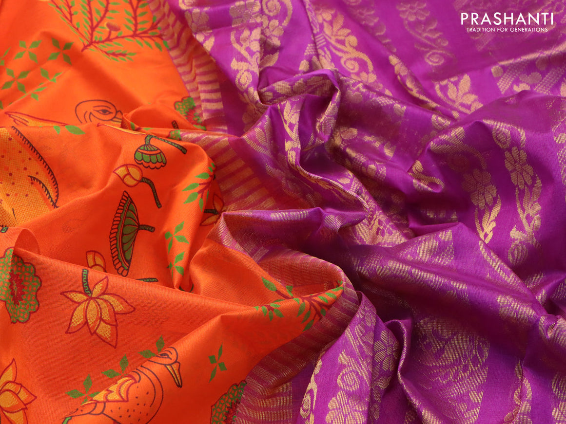 Silk cotton saree orange and purple with allover prints and zari woven border