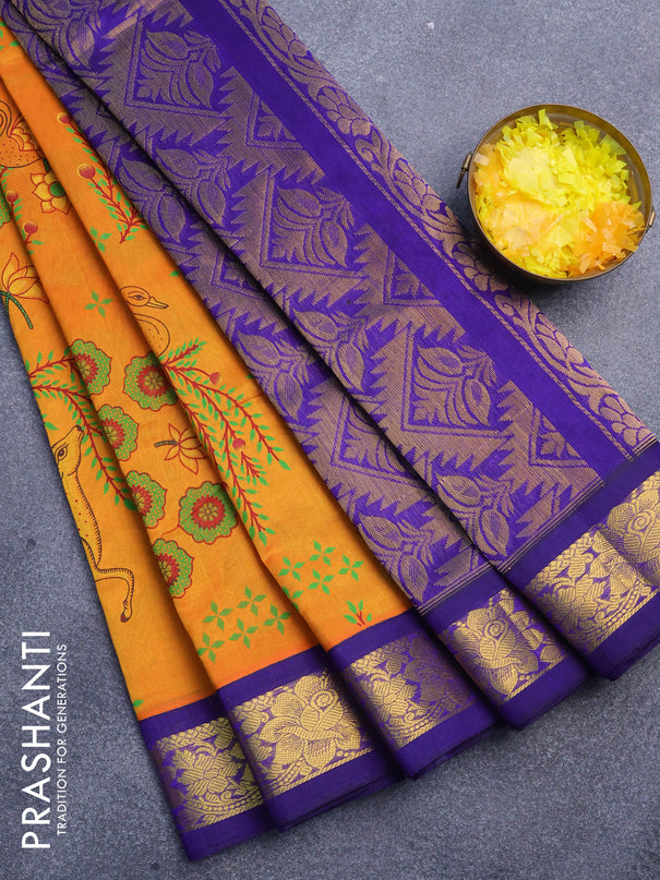 Silk cotton saree dual shade of mustard yellow and blue with allover prints and floral zari woven border