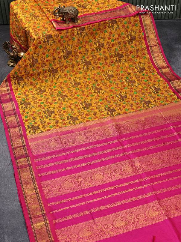 Silk cotton saree mustard yellow and pink with allover kalamkari prints and zari woven border