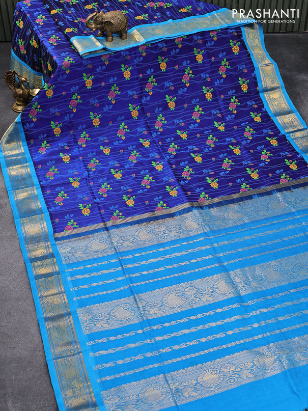 Silk cotton saree blue and cs blue with allover floral prints and zari woven border