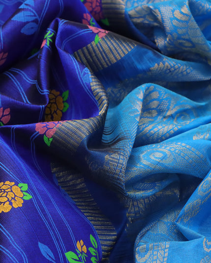 Silk cotton saree blue and cs blue with allover floral prints and zari woven border