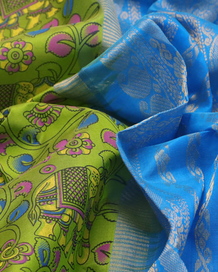 Silk cotton saree light green and cs blue with allover kalamkari prints and paisley zari woven border