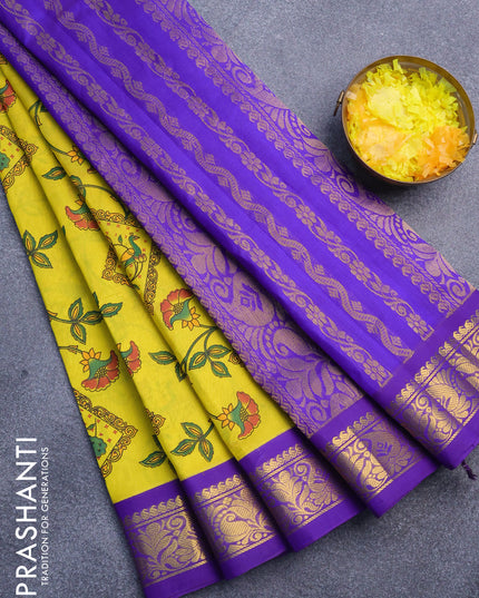 Silk cotton saree yellow and violet with allover kalamkari prints and zari woven border