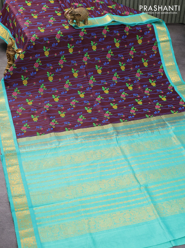 Silk cotton saree coffee brown and teal green with allover floral prints and zari woven border