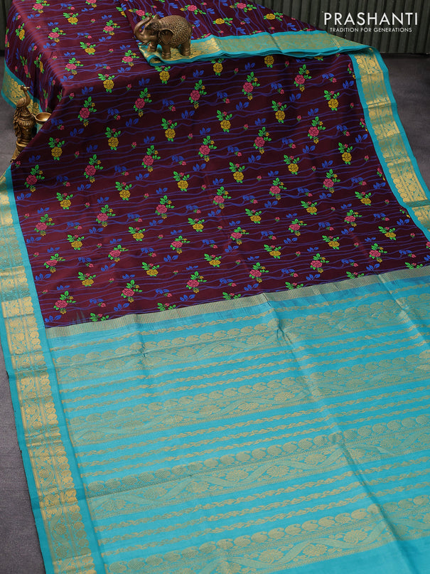 Silk cotton saree coffee brown and teal blue with allover floral prints and paisley zari woven border