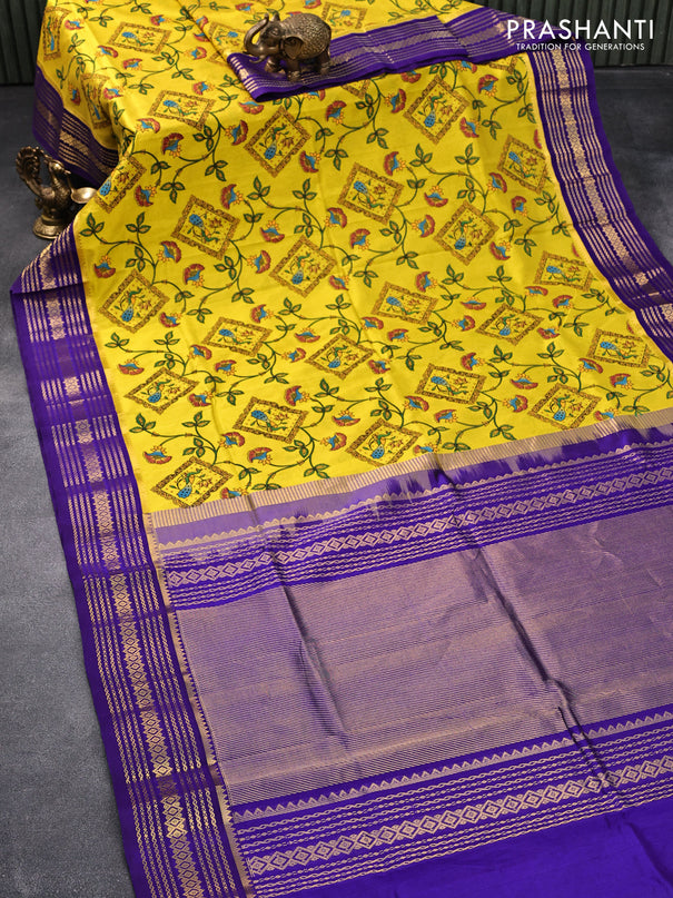 Silk cotton saree yellow and blue with allover floral prints and zari woven border
