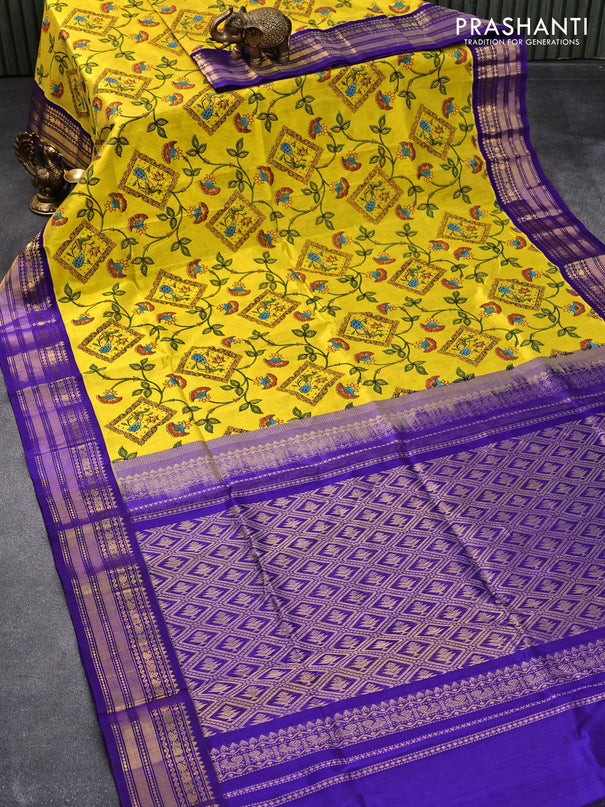 Silk cotton saree yellow and blue with allover floral prints and zari woven border