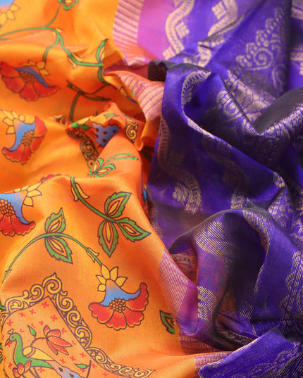Silk cotton saree orange and blue with allover floral prints and zari woven border