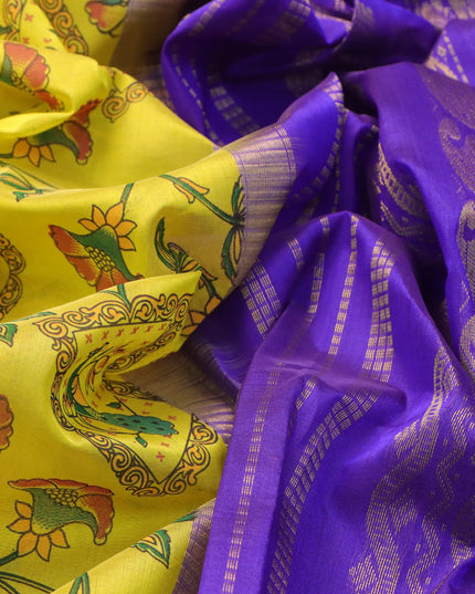 Silk cotton saree lime yellow and blue with allover floral prints and paisley zari woven border
