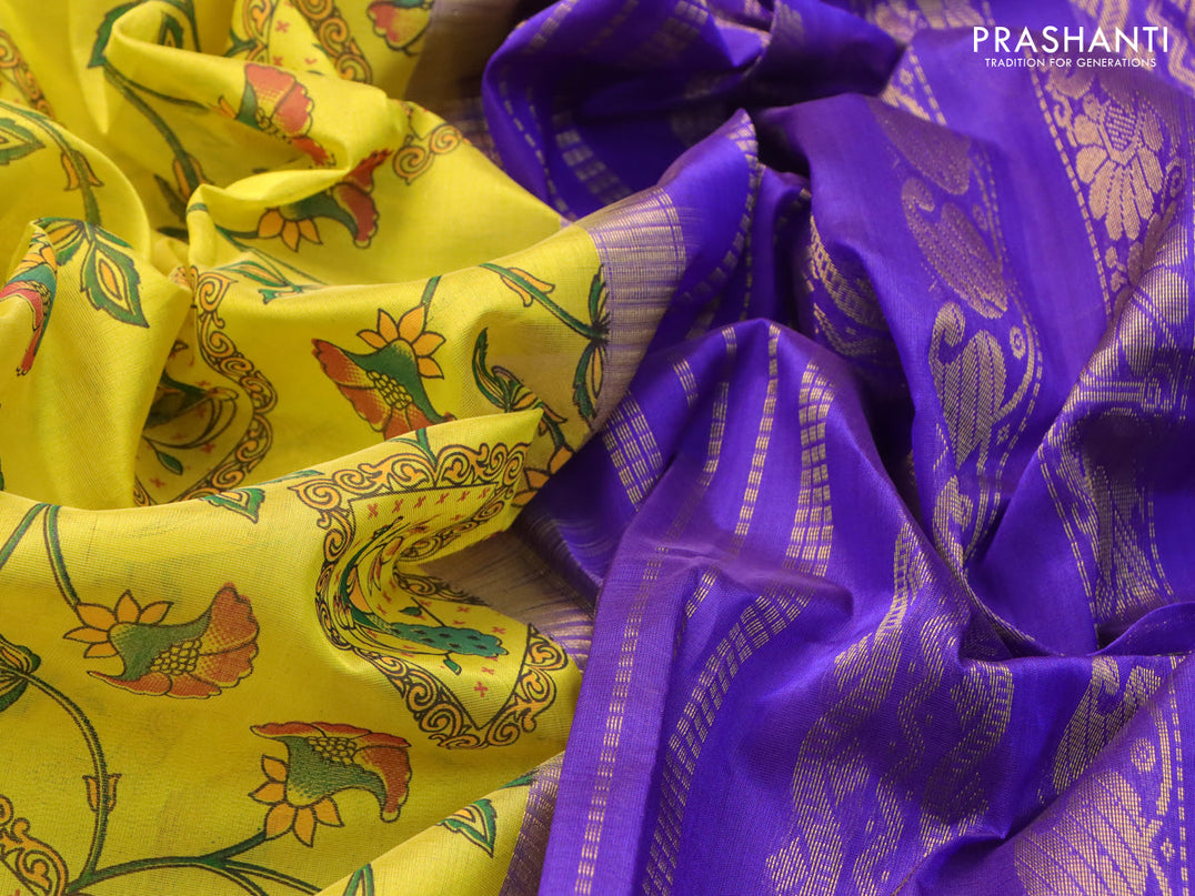 Silk cotton saree lime yellow and blue with allover floral prints and paisley zari woven border