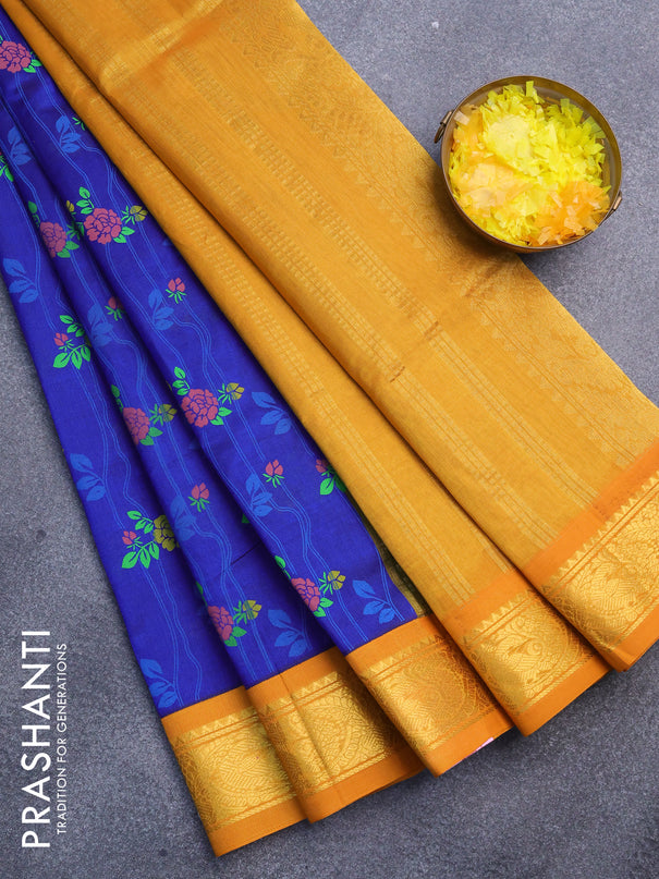 Silk cotton saree blue and mustard yellow with allover floral prints and zari woven border