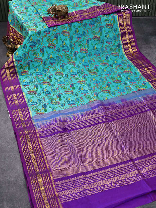 Silk cotton saree teal blue and purple with allover kalamkari prints and zari woven border