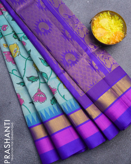 Silk cotton saree teal green shade and blue with allover floral prints and temple design zari woven simple border