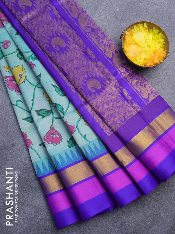Silk cotton saree teal green shade and blue with allover floral prints and temple design zari woven simple border