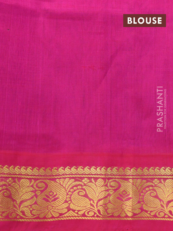 Silk cotton saree blue and pink with allover floral prints and zari woven korvai border