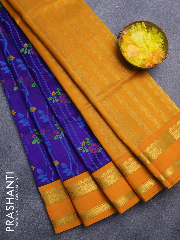 Silk cotton saree blue and mustard yellow with allover floral prints and rettapet zari woven border