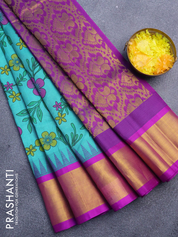 Silk cotton saree teal blue and purple with allover floral prints and temple design zari woven border