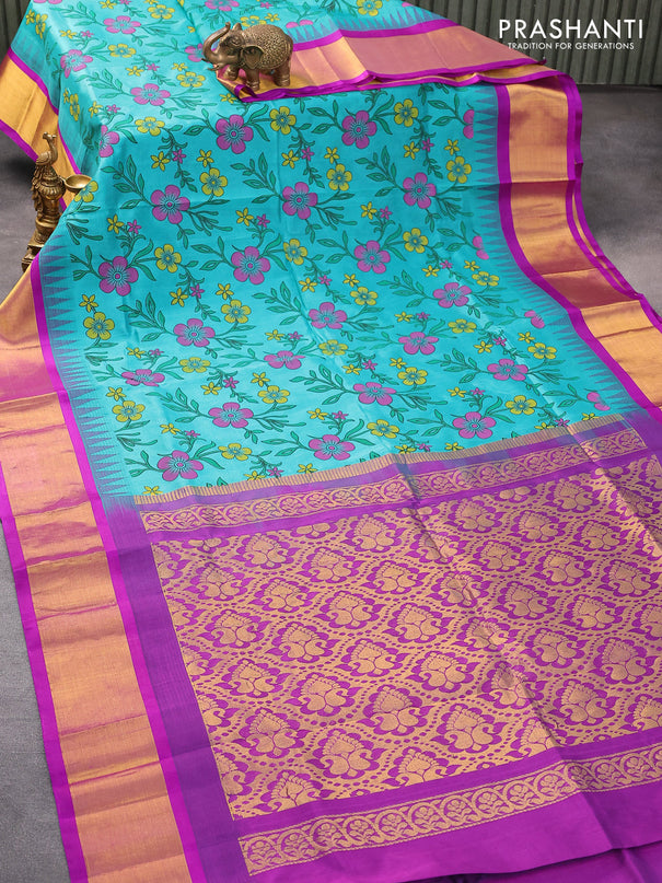 Silk cotton saree teal blue and purple with allover floral prints and temple design zari woven border