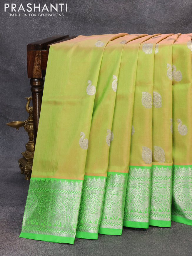 Venkatagiri silk saree dual shade of light greenish pink and parrot green with silver zari woven buttas and peacock silver zari woven border